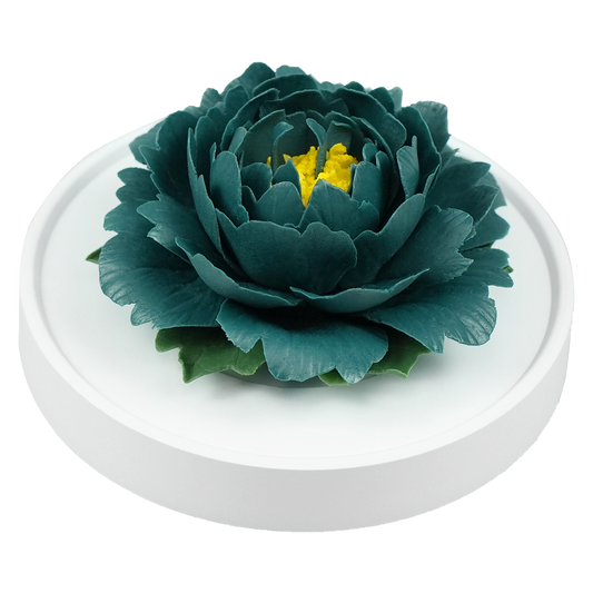 Luxury ceramic flower scent diffuser for home in dark green, peony, displayed from side