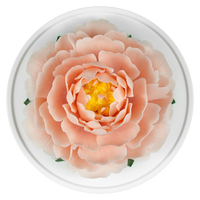 Luxury ceramic flower scent diffuser for home in peach pink, peony, displayed from above