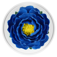 Luxury ceramic flower scent diffuser for home in blue, peony, displayed from above