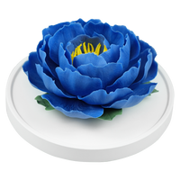 Luxury ceramic flower scent diffuser for home in blue, peony, displayed from side