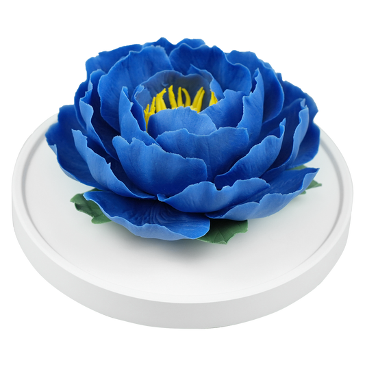 Luxury ceramic flower scent diffuser for home in blue, peony, displayed from side