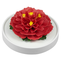 Luxury ceramic flower scent diffuser for home in red, dahlia, displayed from side
