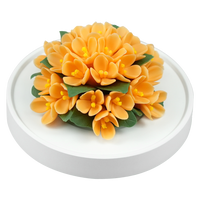 Luxury ceramic flower scent diffuser for home in orange, fragrant olive, displayed from side