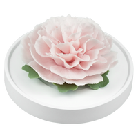 Luxury ceramic flower scent diffuser for home in pale pink, carnation, displayed from side