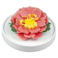 Luxury ceramic flower scent diffuser for home in red, tree peony, displayed from side