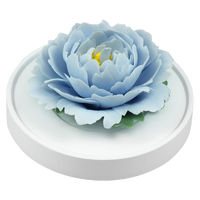Luxury ceramic flower scent diffuser for home in light blue, peony, displayed from side