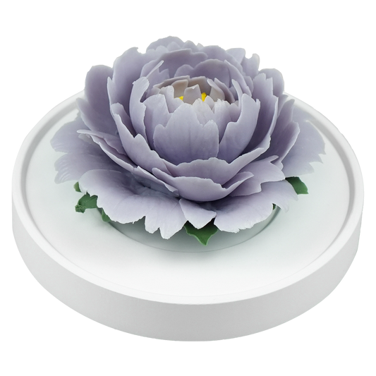Luxury ceramic flower scent diffuser for home in light purple, peony, displayed from side
