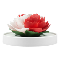 Luxury ceramic flower scent diffuser for home in pink and red, peony, displayed from front