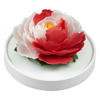 Luxury ceramic flower scent diffuser for home in pink and red, peony, displayed from side