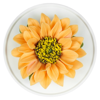 Luxury ceramic flower scent diffuser for home in orange, sunflower, displayed from above