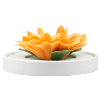 Luxury ceramic flower scent diffuser for home in orange, sunflower, displayed from side