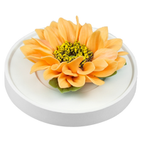 Luxury ceramic flower scent diffuser for home in orange, sunflower, displayed from side