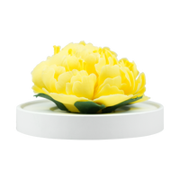 Luxury ceramic flower scent diffuser for home in yellow, mum, displayed from front